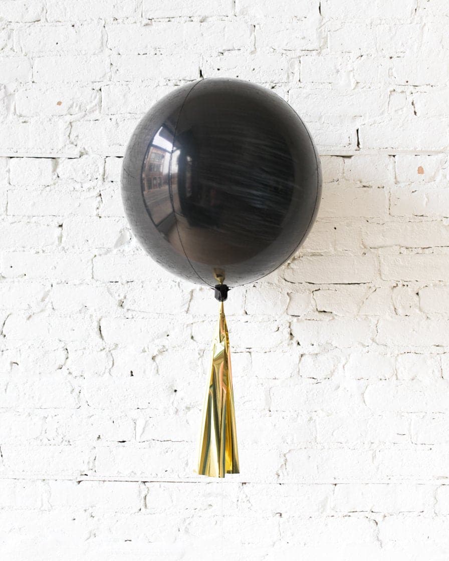 16in Black Orb Foil Balloon and Gold Skirt | Purchase 16in Black Orb Foil Balloon and Gold Skirt | Purchase